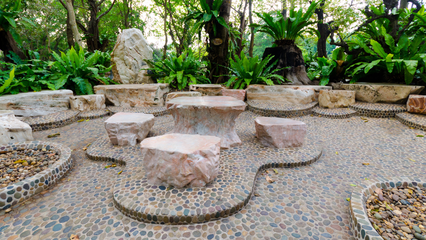 A rock garden with a variety of rocks and plants